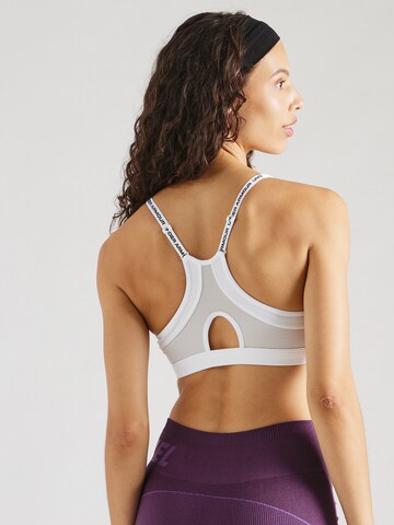 UNDER ARMOUR Bustier Biustonosz sportowy 'Infinity' w kolorze biały