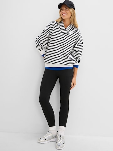 bonprix Skinny Legíny – černá: přední strana