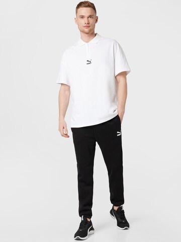 PUMA Tapered Broek in Zwart