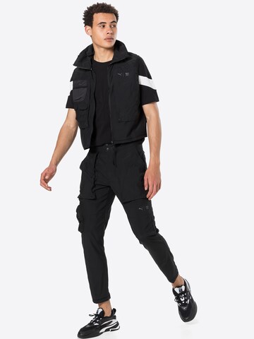 PUMA Sportbodywarmer in Zwart