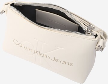 Calvin Klein Jeans - Mala de ombro em bege
