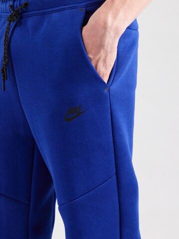 Nike Sportswear Конический (Tapered) Штаны 'TCH FLC' в Синий