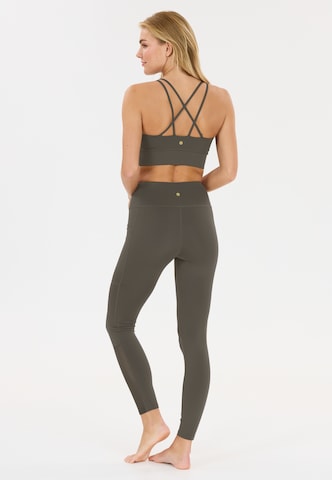 Athlecia Skinny Sportbroek 'Elli' in Bruin