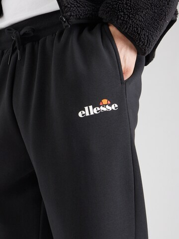 ELLESSE Voľný strih Nohavice 'Arzoni' - Čierna