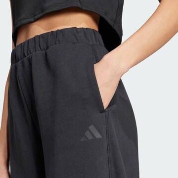 ADIDAS SPORTSWEAR Loosefit Παντελόνι φόρμας 'City Escape' σε μαύρο