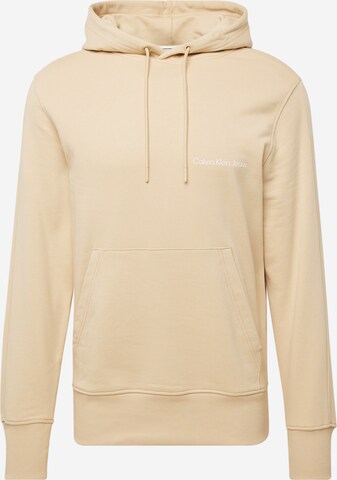 Sweat-shirt Calvin Klein Jeans en beige : devant