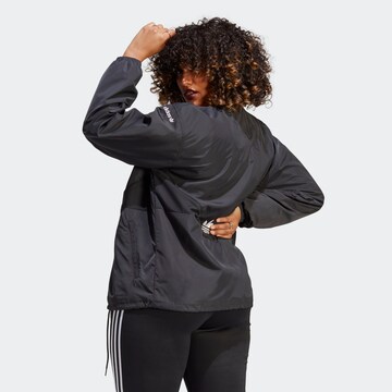 juoda ADIDAS ORIGINALS Demisezoninė striukė 'Cover Up'