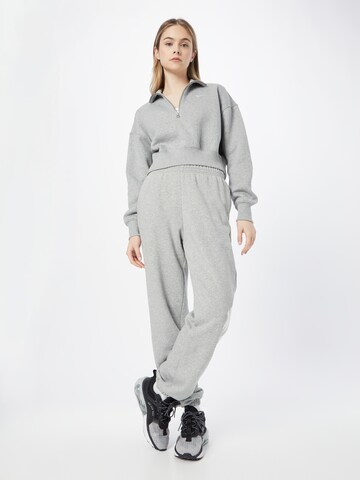 Nike Sportswear - Tapered Calças 'Emea' em cinzento