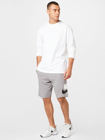 Regular Pantalon 'Essentials' Nike Sportswear en gris