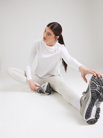 Maglia funzionale 'Mandes' di Athlecia in bianco