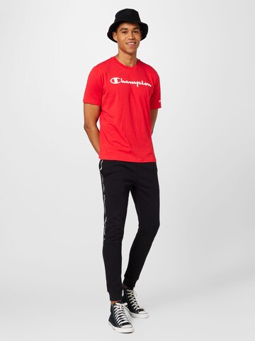 Tapered Pantaloni di Champion Authentic Athletic Apparel in nero