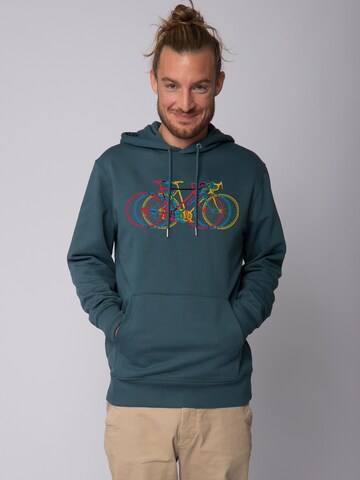 Sweat-shirt 'Fahrräder' Watapparel en bleu : devant