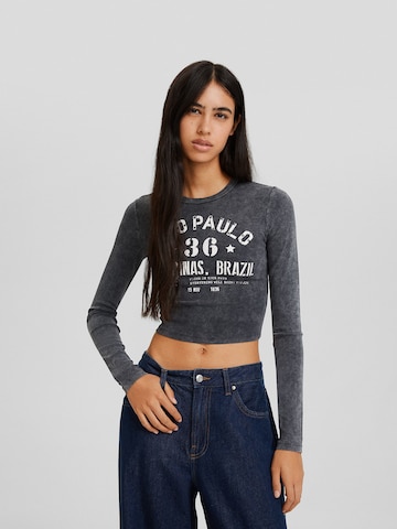 T-shirt Bershka en bleu : devant