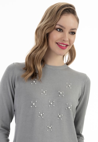 Pullover di faina in grigio