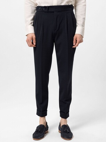 Antioch Tapered Pleat-front trousers in Blue: front
