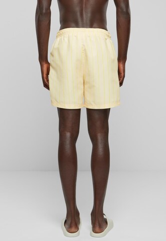 Shorts de bain Karl Kani en jaune