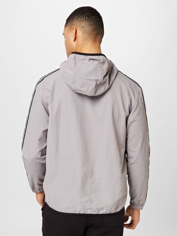 Champion Authentic Athletic Apparel Athletic Jacket in Grey