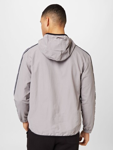 Champion Authentic Athletic Apparel Sports jacket in Grey