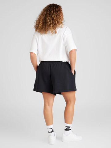 Nike Sportswear Loosefit Shorts 'PHNX FLC' in Schwarz
