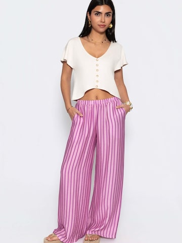 SASSYCLASSY Loose fit Trousers in Pink: front