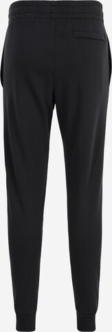 UNDER ARMOUR Tapered Sportbroek in Zwart