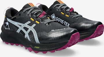 Chaussure de course ASICS en noir