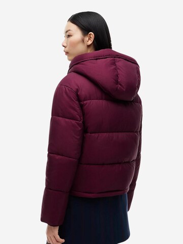 Tommy Jeans Vinterjacka 'TJW HOODED PUFFER JA DW0DW21625' i röd