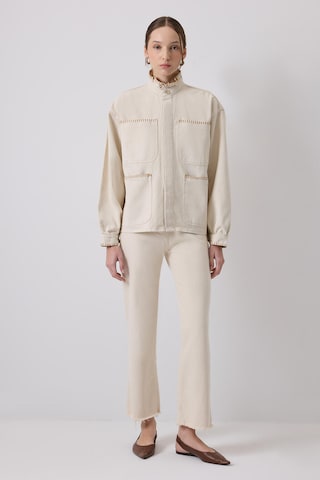 Veste mi-saison Touche Prive en blanc