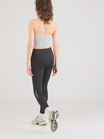 UNDER ARMOUR - Skinny Pantalón deportivo 'Velociti' en negro