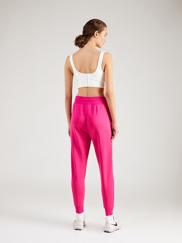 NIKE Tapered Sportbroek 'ONE' in Rood