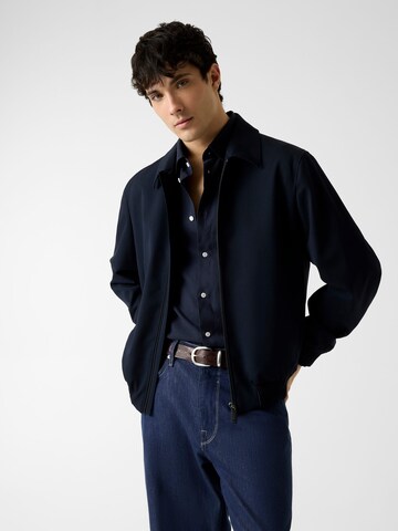 GUESS Between-Season Jacket in Blue: front