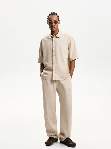 Bershka Loose fit Trousers in Beige