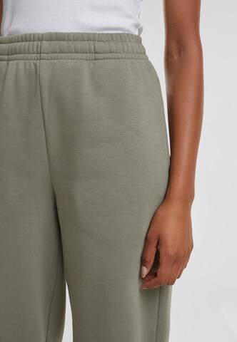Urban Classics Конический (Tapered) Штаны в Зеленый
