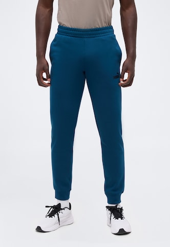 PUMA Regular Sports trousers 'ESS No. 1' in Green: front