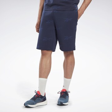 Reebok Normalny krój Spodnie sportowe w kolorze niebieski: przód