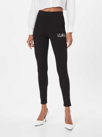 The Couture Club Skinny Leggings in Black: front