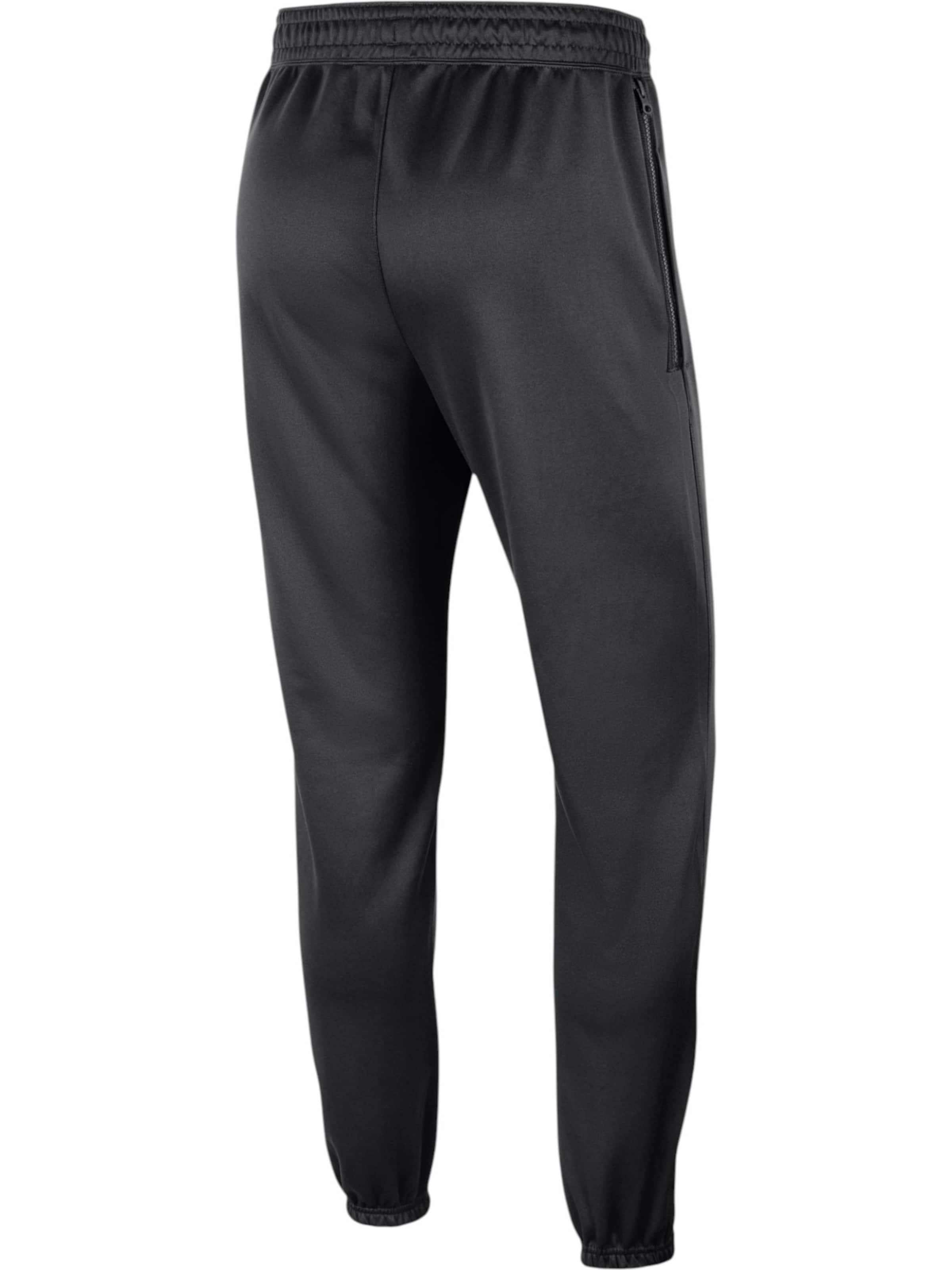Nike Sportswear Tapered Functionele broek in Zwart