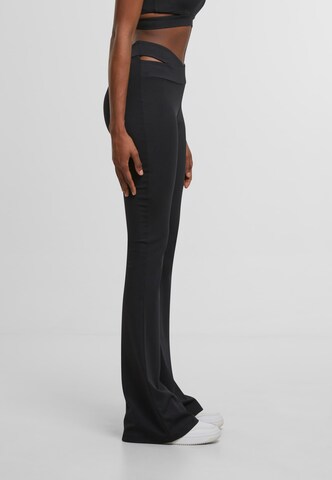 Karl Kani Flared Trousers in Black