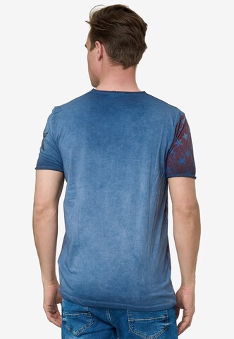 Rusty Neal Cooles T-Shirt mit V-Ausschnitt in Blau