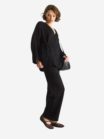 Pantalons de tailleur Bianco Lucci en noir