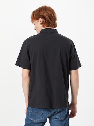 LEVI'S ® Μπλουζάκι 'Graphic Vintage Fit Polo' σε μαύρο