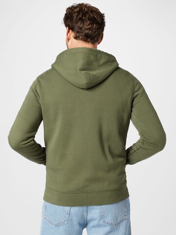 LEVI'S ® Collegetakki 'Zip Up Hoodie' värissä vihreä