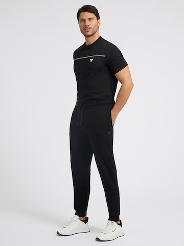 GUESS Tapered Hose in Schwarz