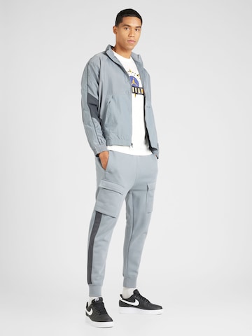 Nike SportswearPrijelazna jakna 'AIR' - siva boja
