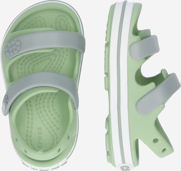 Crocs - Sapatos abertos 'Cruiser' em verde