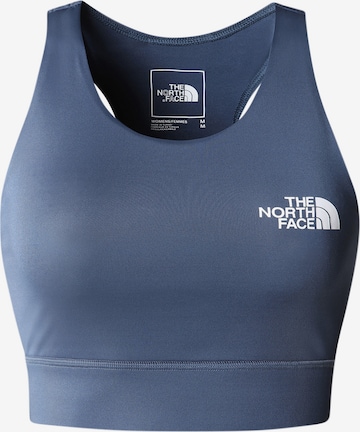 THE NORTH FACE - Bustier Sujetador deportivo en azul: frente