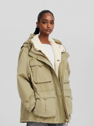 Bershka Winter parka in Green: front