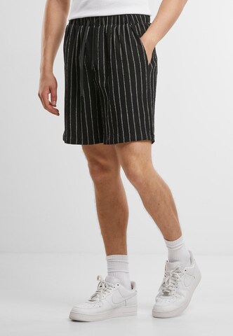 Urban Classics Regular Pants in Black: front