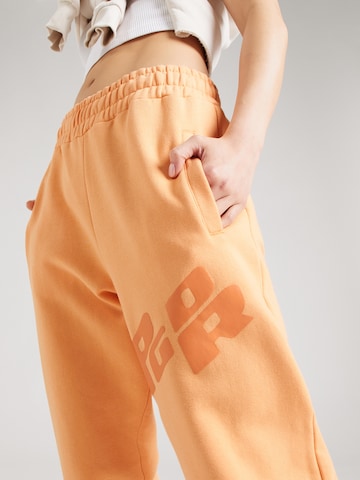 Effilé Pantalon 'JULAGO' Pegador en orange