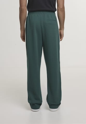 Loosefit Pantaloni di Karl Kani in verde